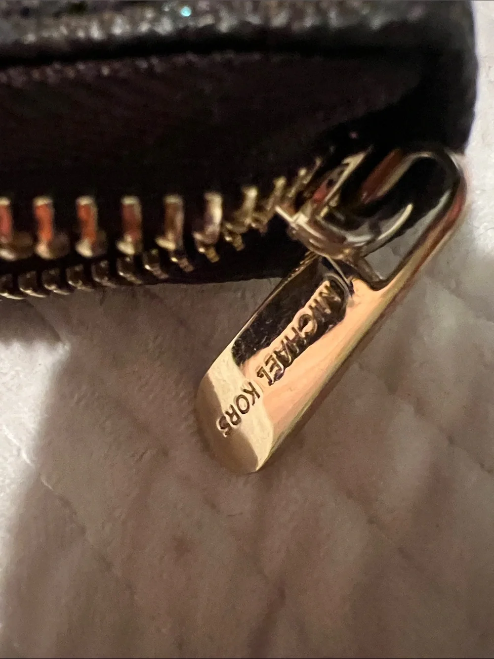 Michael Kors signature logo